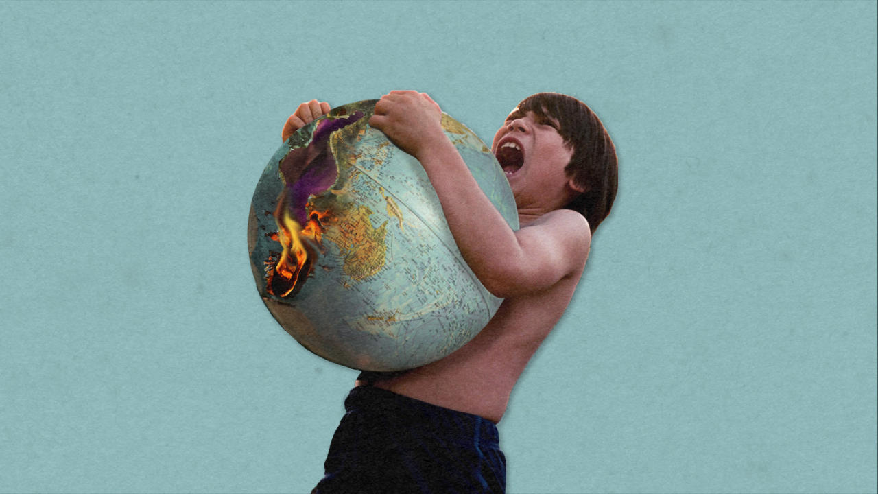 Boy squeezing globe