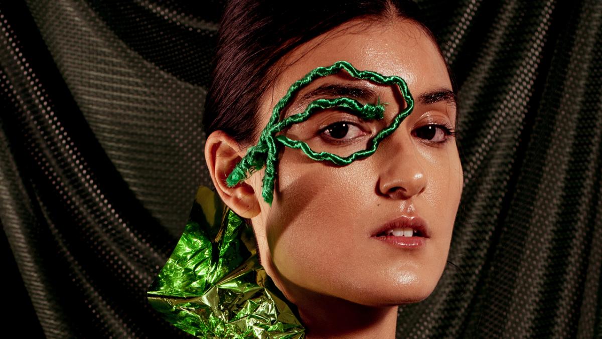 female face with green mask