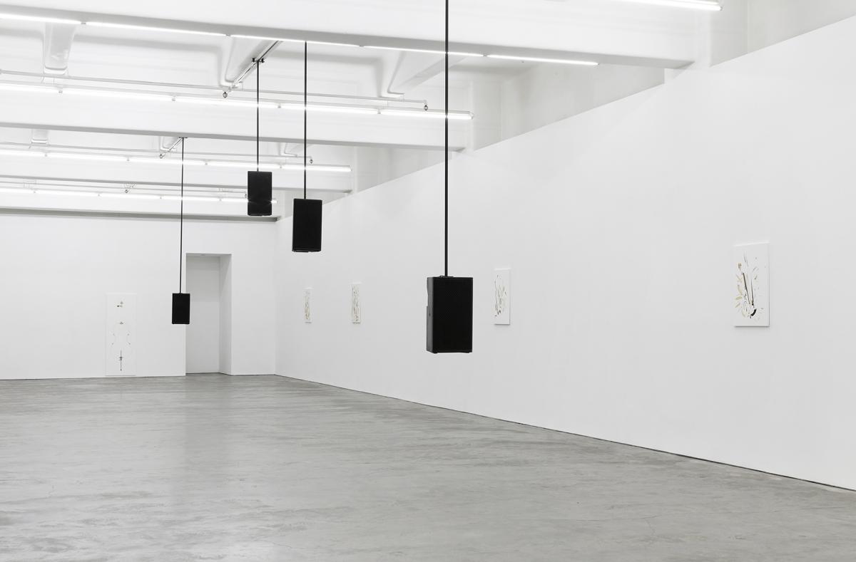 speakers hanging white room