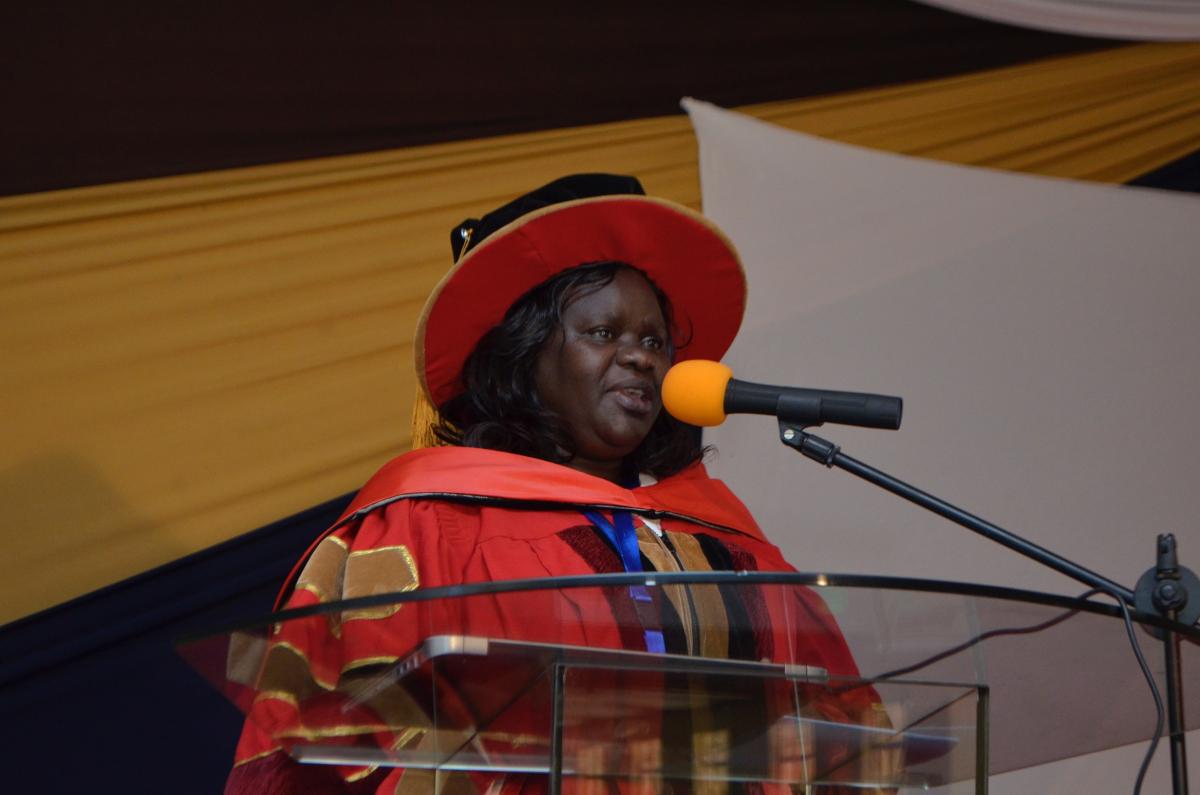 Professor Akenga at lectern