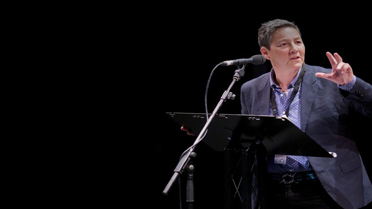 photo of a man at lectern